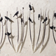 Image for article titled Delicate Images of Birds Painstakingly Clipped from Real Feathers